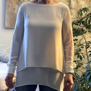 Cream colored, long, layered & flowy blouse